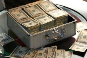 Small chest full of stacked money
