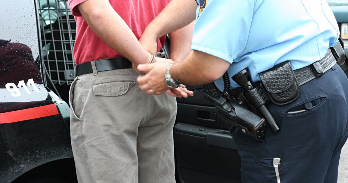 police handcuffing suspect