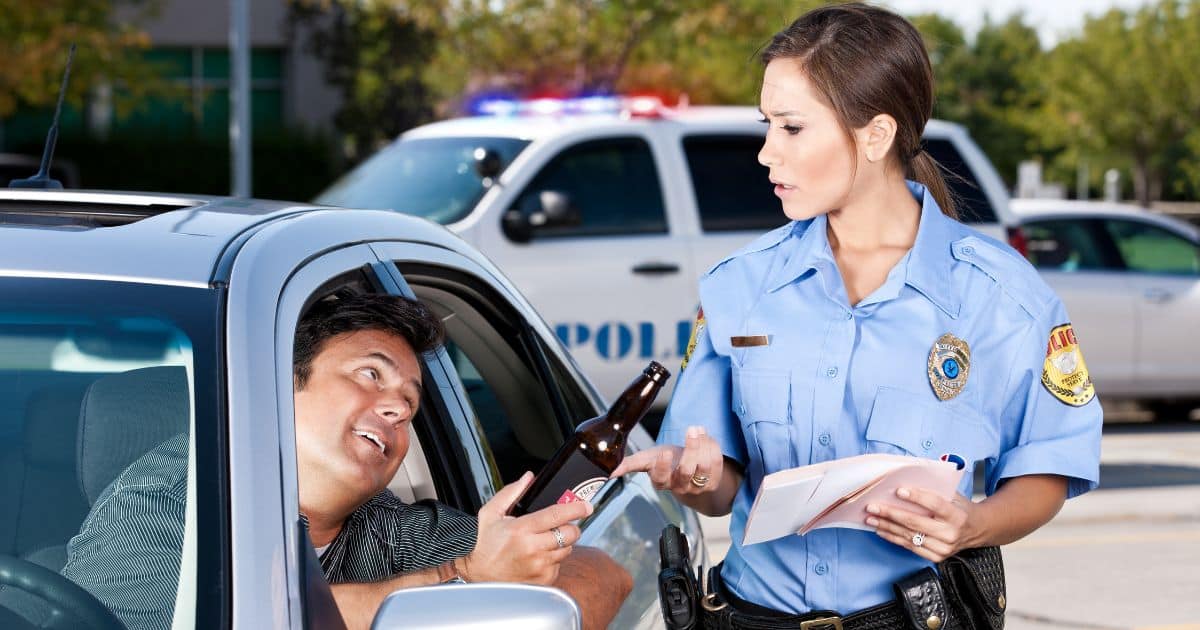 Officer approaching drunk driver