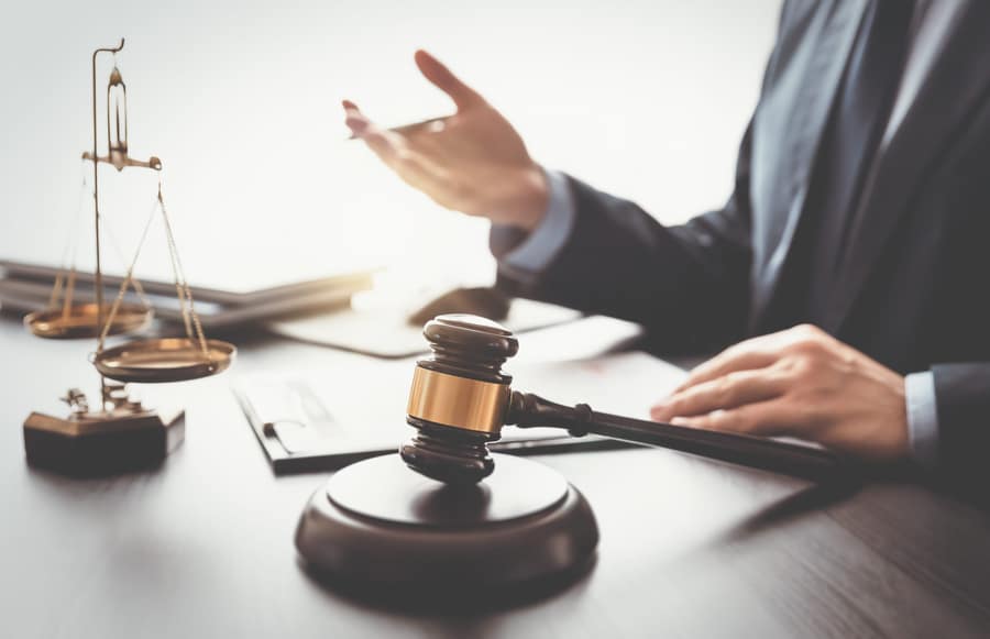 Lawyer, attorney with gavel working in the office.